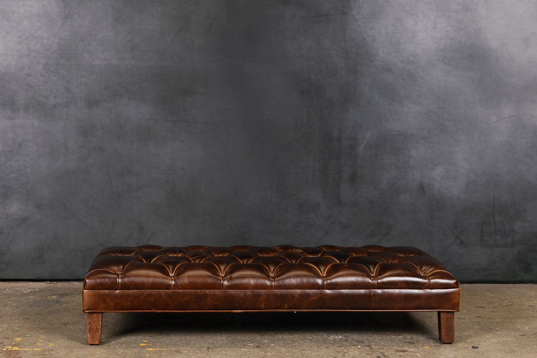 CHATEAU LEATHER TUFTED OTTOMAN