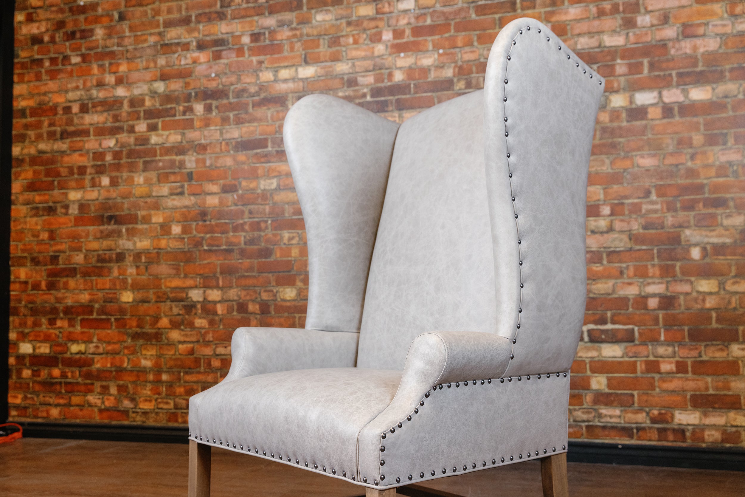 WINGBACK HIGH BACK FLOOR MODEL CHAIR