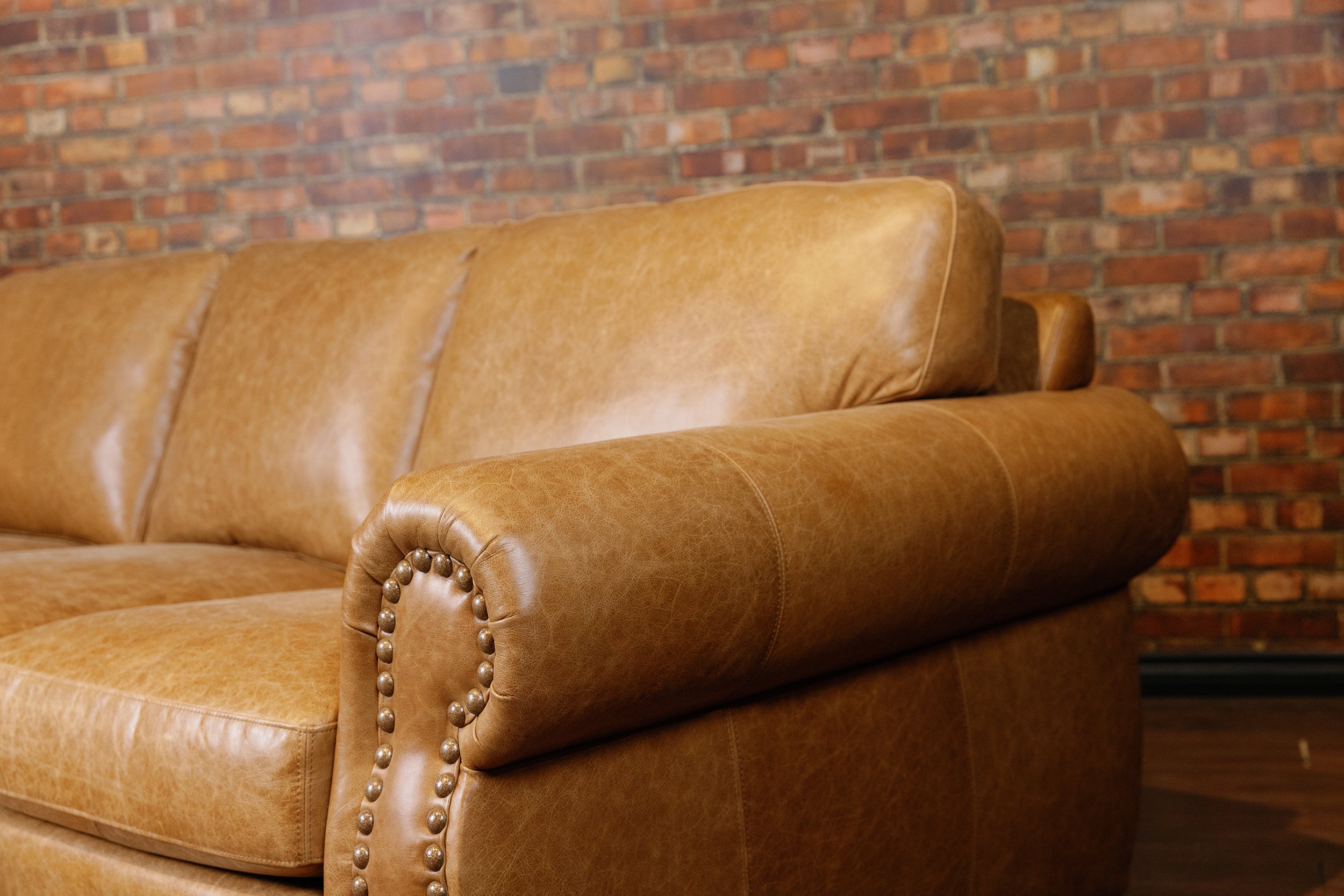 HOSS LEATHER SOFA FLOOR MODEL AS IS