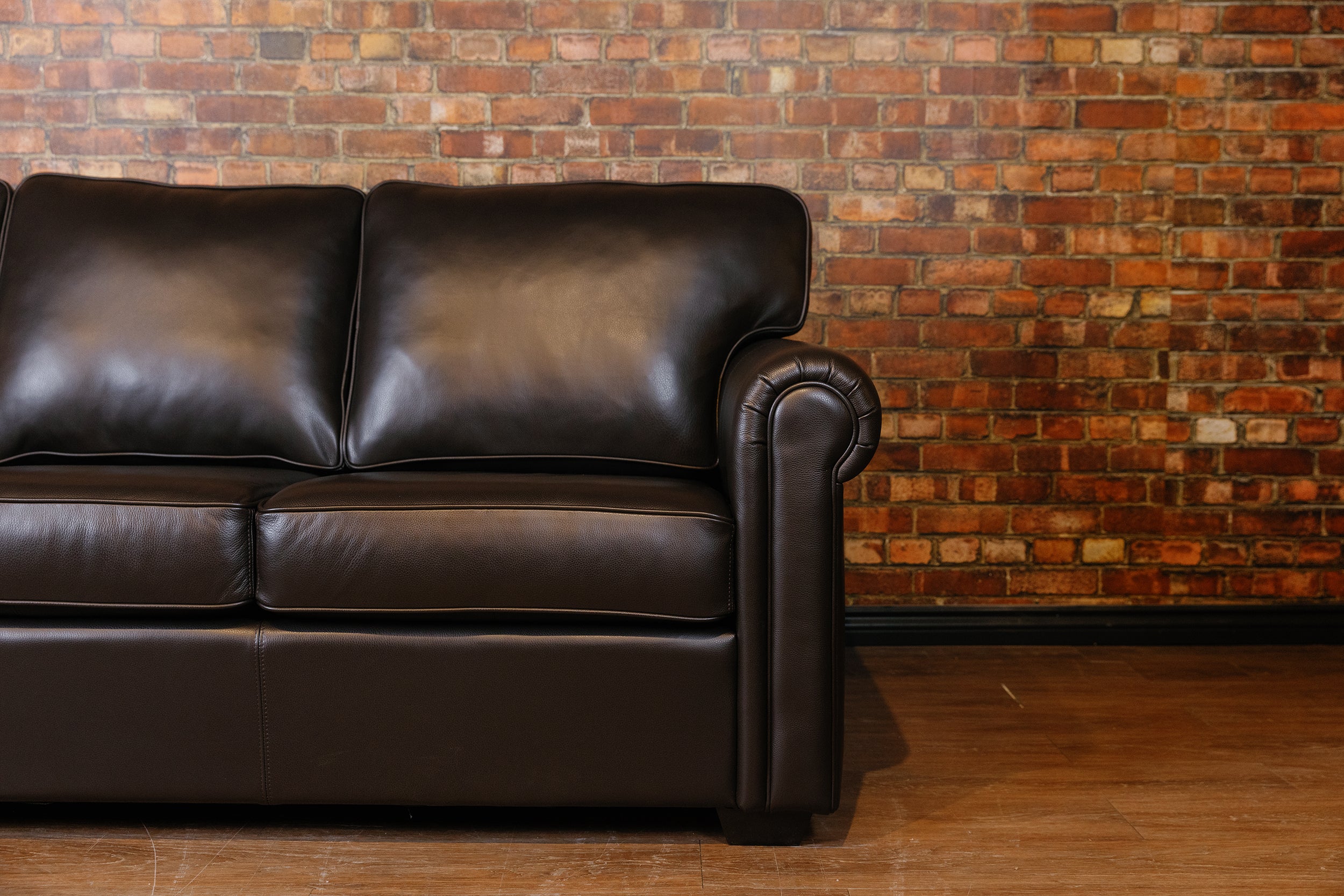 CORAL LEATHER SOFA FLOOR MODEL( SOLD)