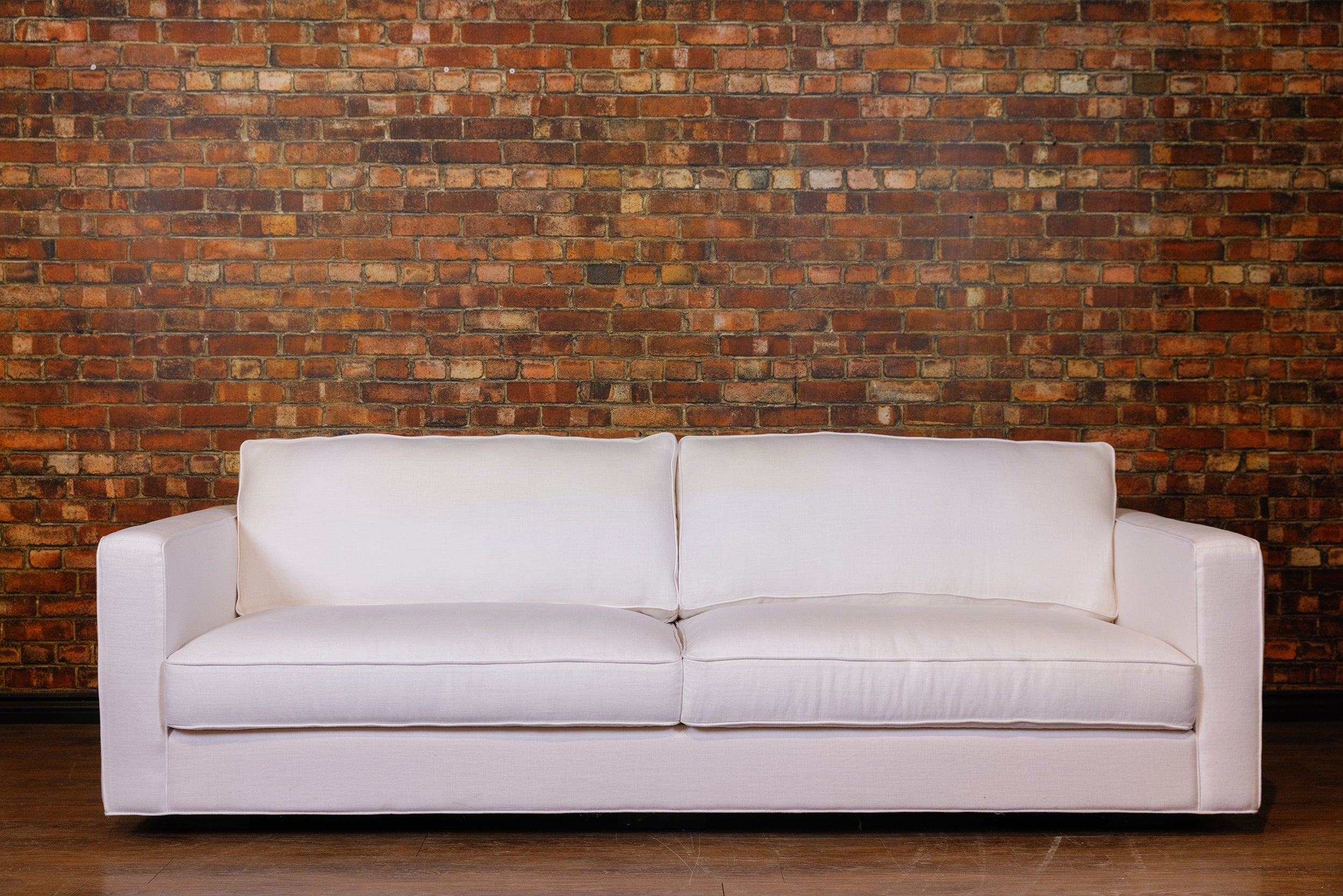 MADDEX SLIM ARM SOFA 96 INCH FABRIC FLOOR MODEL