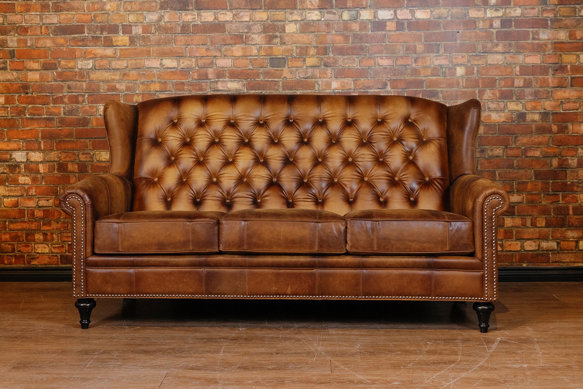 TUFTED BACK JAMISON FLOOR MODEL SOFA