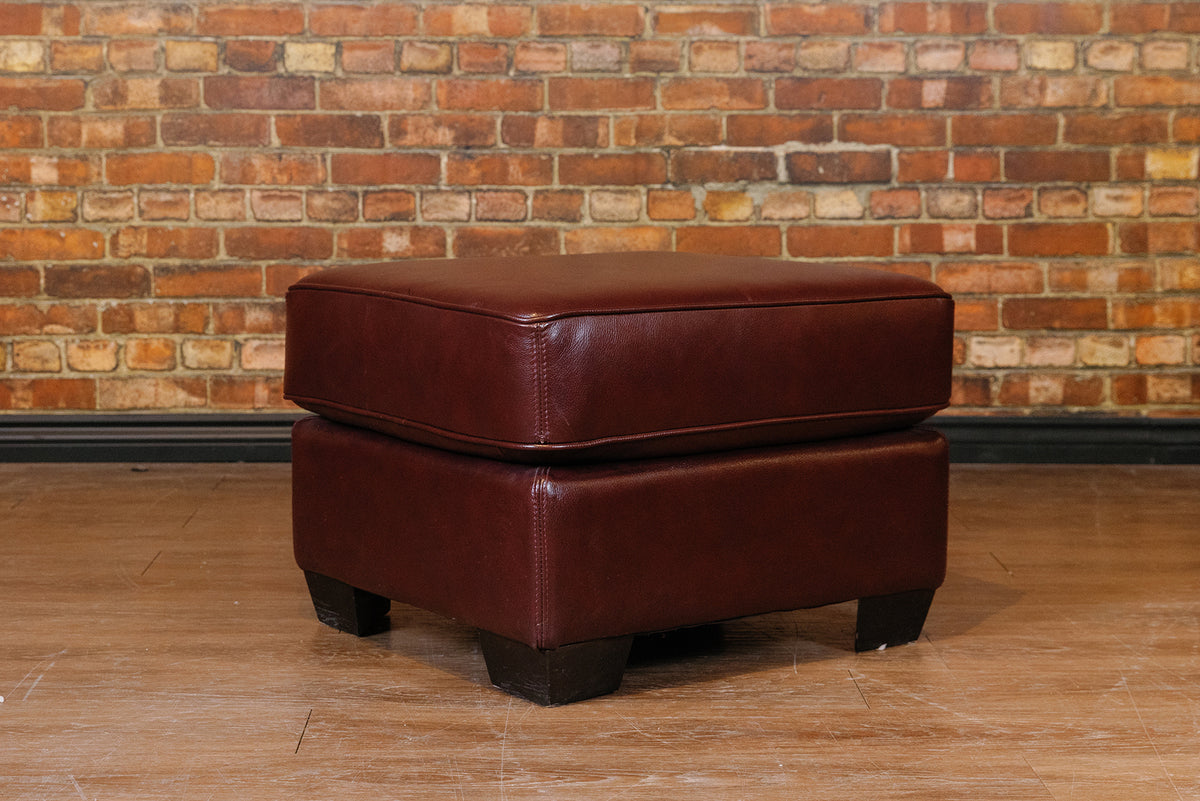 BROWN CUSHION OTTOMAN FLOOR MODEL