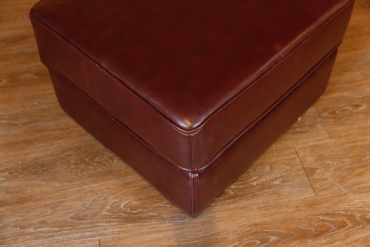BROWN CUSHION OTTOMAN FLOOR MODEL