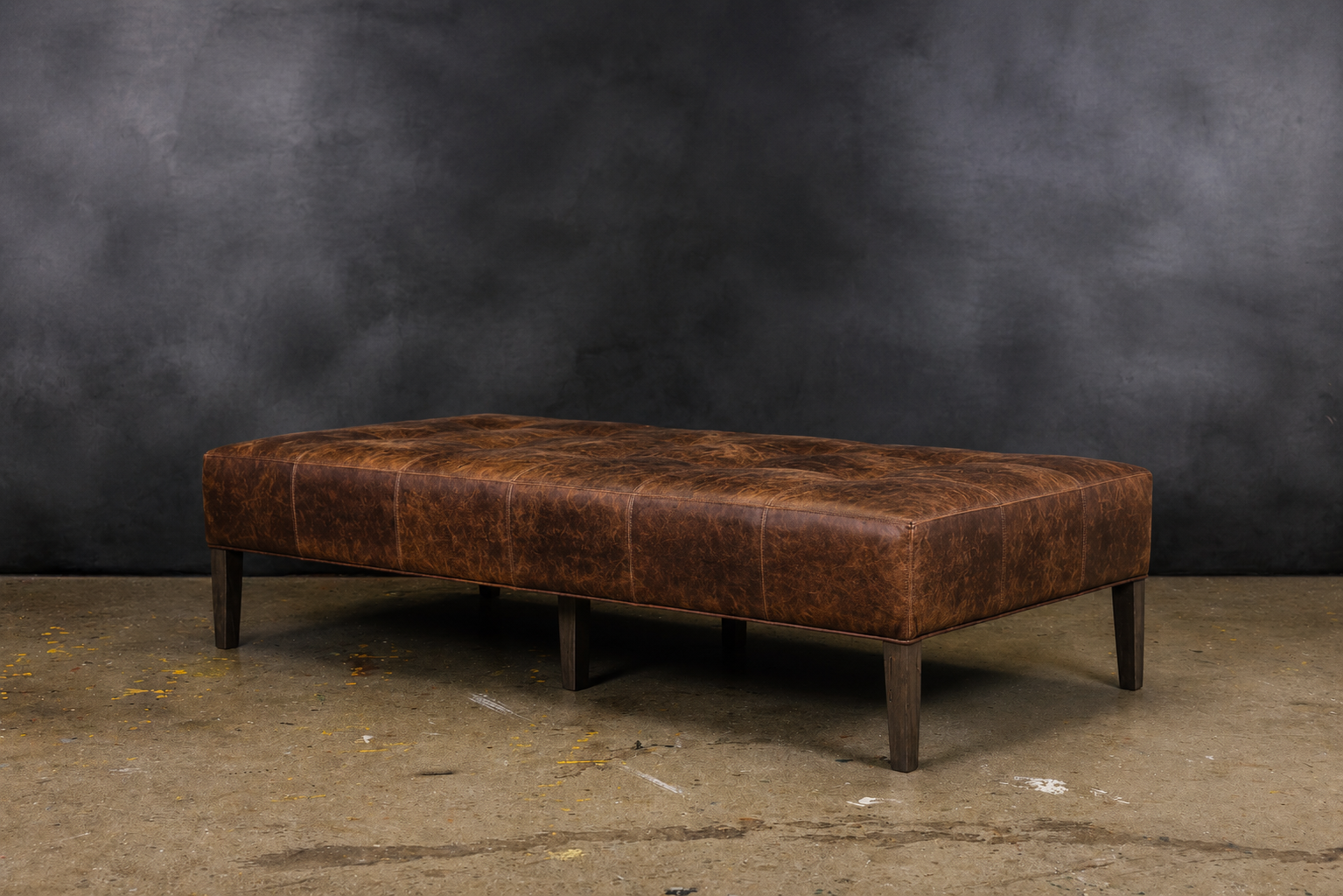 EXPLORER LEATHER OTTOMANS