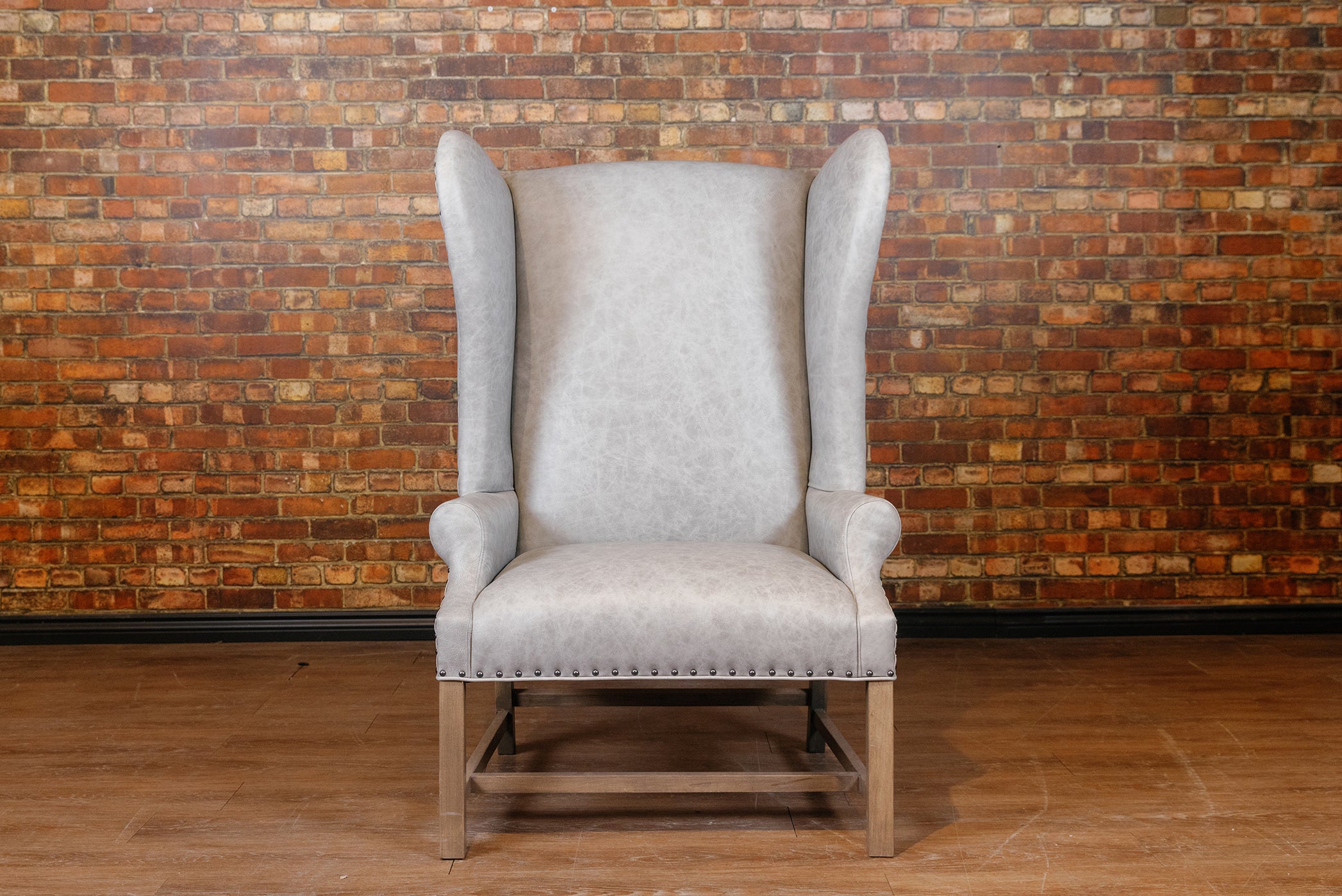 WINGBACK HIGH BACK FLOOR MODEL CHAIR