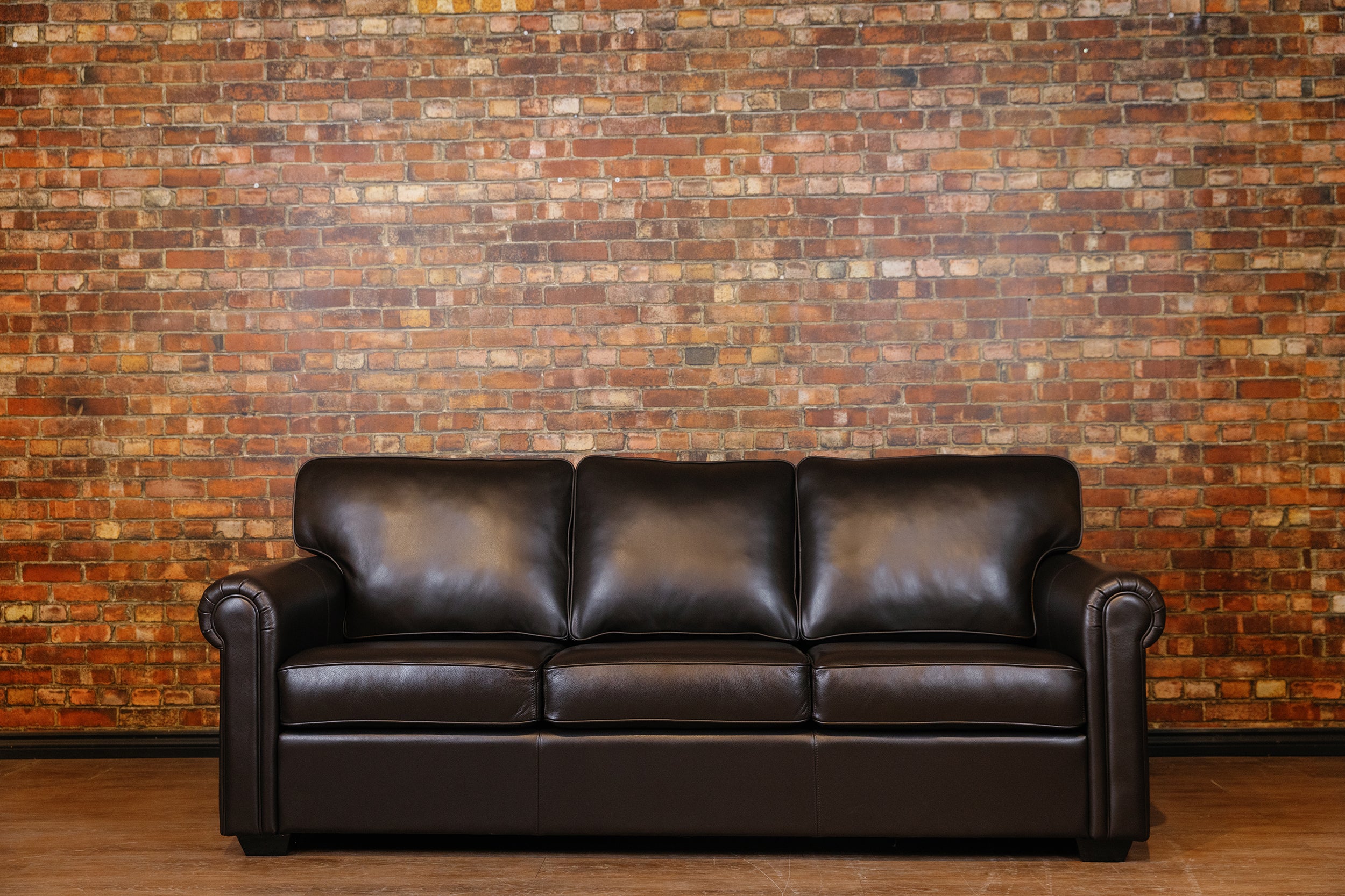 CORAL LEATHER SOFA FLOOR MODEL( SOLD)