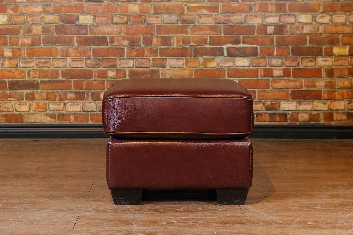 BROWN CUSHION OTTOMAN FLOOR MODEL