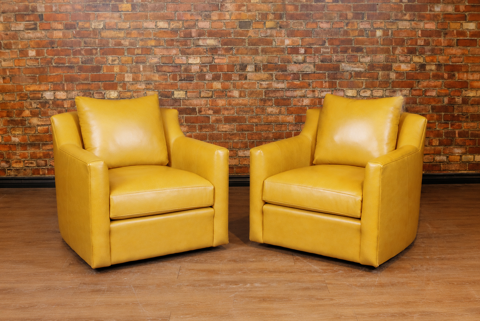 2 LOUVRE SWIVEL CHAIRS FLOOR MODELS