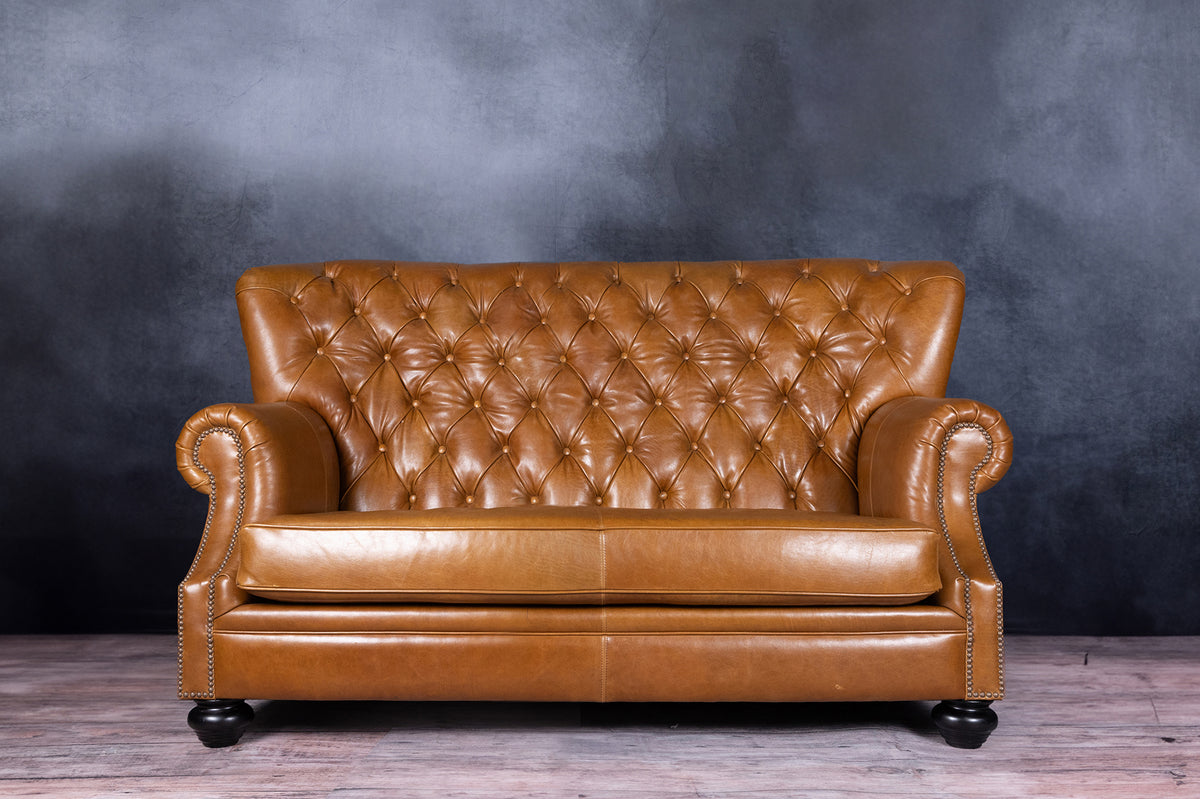 WRITERS LEATHER LOVESEAT